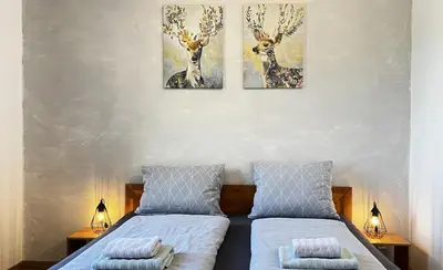 Ein Bett oder Betten in einem Zimmer der Unterkunft Hotel Bühlerhof