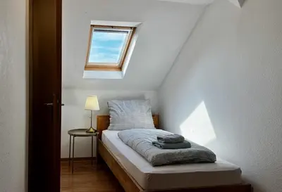 Ein Bett oder Betten in einem Zimmer der Unterkunft Hotel Bühlerhof