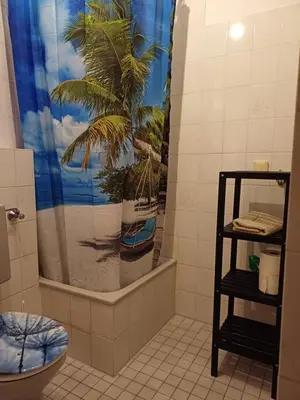 Ein Badezimmer in der Unterkunft Appartement Farbenfroh