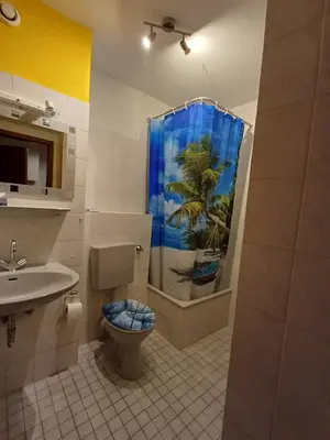 Ein Badezimmer in der Unterkunft Appartement Farbenfroh