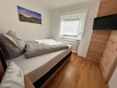 Ein Bett oder Betten in einem Zimmer der Unterkunft Ferienhaus Muskatellerhof