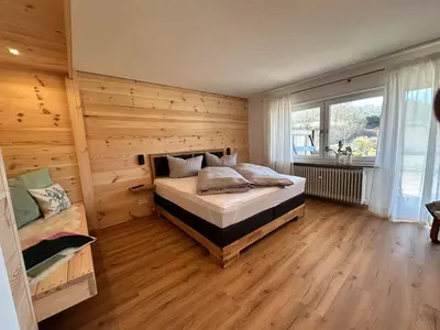 Ein Bett oder Betten in einem Zimmer der Unterkunft Ferienhaus Muskatellerhof