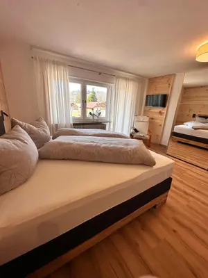 Ein Bett oder Betten in einem Zimmer der Unterkunft Ferienhaus Muskatellerhof