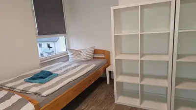 Ein Bett oder Betten in einem Zimmer der Unterkunft Komfortable Monteurwohnung auf Zeit