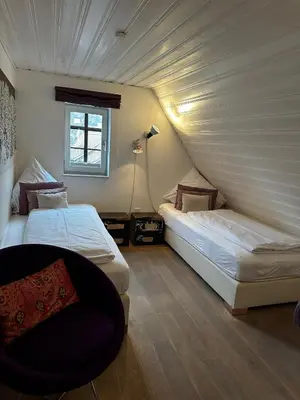 Ein Bett oder Betten in einem Zimmer der Unterkunft die Träumerei GmbH