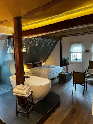 Ein Bett oder Betten in einem Zimmer der Unterkunft die Träumerei GmbH
