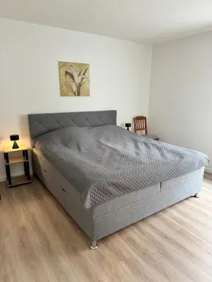 Ein Bett oder Betten in einem Zimmer der Unterkunft Apartment Rose