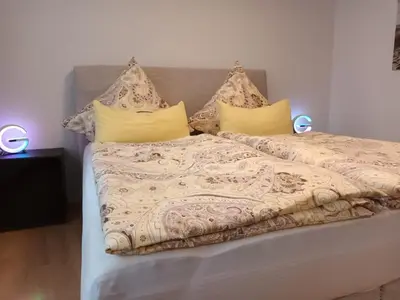 Ein Bett oder Betten in einem Zimmer der Unterkunft Ferienwohnung Blum