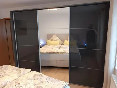 Ein Bett oder Betten in einem Zimmer der Unterkunft Ferienwohnung Blum