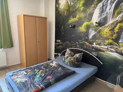 Ein Bett oder Betten in einem Zimmer der Unterkunft Monteurunterkunft