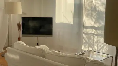 TV/Unterhaltungsangebot in der Unterkunft Malerische Terrasse - Modern 