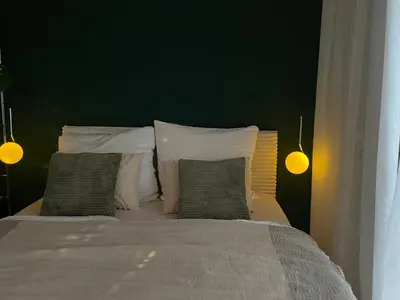 Ein Bett oder Betten in einem Zimmer der Unterkunft Malerische Terrasse - Modern 