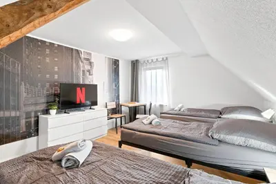 Ein Bett oder Betten in einem Zimmer der Unterkunft DZ03 Praktische Monteurwohnung 6 Einzelbetten