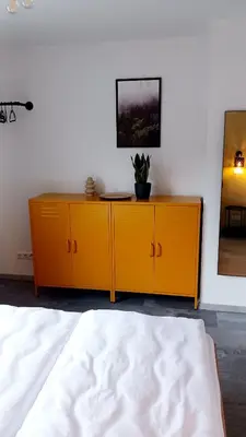 Ein Bett oder Betten in einem Zimmer der Unterkunft Ferienhaus am Wald