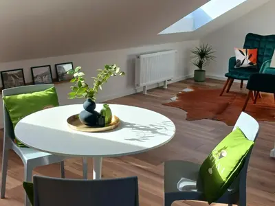Ein Sitzbereich in der Unterkunft Ferienhaus am Wald