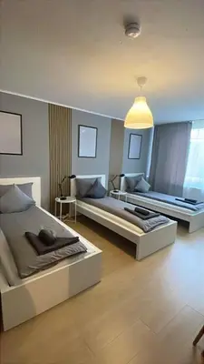 Ein Bett oder Betten in einem Zimmer der Unterkunft modern accomodation