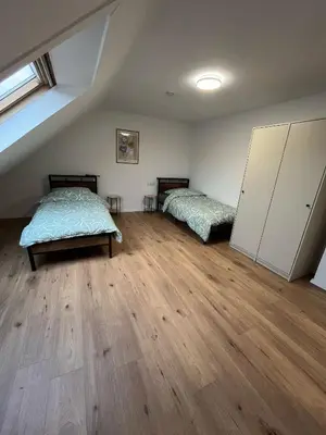Ein Bett oder Betten in einem Zimmer der Unterkunft nJoy! Business Apartment Pforzheim - gratis WLAN