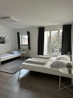 Ein Bett oder Betten in einem Zimmer der Unterkunft einladende Wohnung im Herzen von Sinsheim