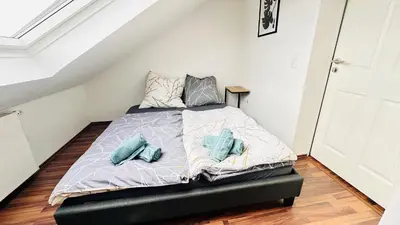 Ein Bett oder Betten in einem Zimmer der Unterkunft Stylisches Appartement mit Weitblick