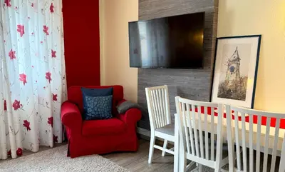 Ein Sitzbereich in der Unterkunft DomPanorama DER WEISSE PFAU Apartment für 2-4Pers