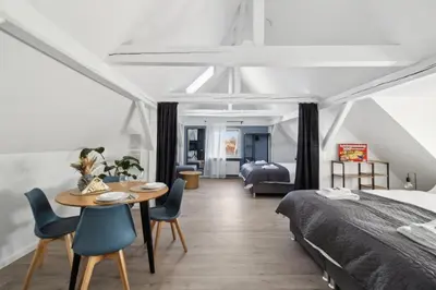 Ein Bett oder Betten in einem Zimmer der Unterkunft Amalfi A10 - 4 Betten - gemütlich und modern