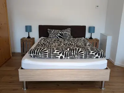 Ein Bett oder Betten in einem Zimmer der Unterkunft Apartment im Grünen