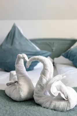 Ein Bett oder Betten in einem Zimmer der Unterkunft Landgasthaus Zum Engel