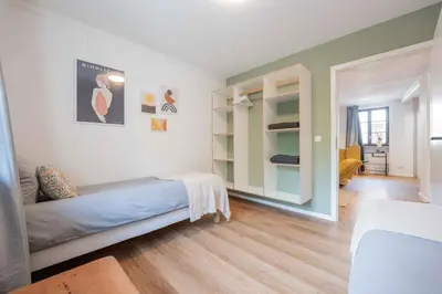 Ein Bett oder Betten in einem Zimmer der Unterkunft FREYZEIT Apartments Speyer