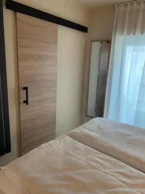 Ein Bett oder Betten in einem Zimmer der Unterkunft Marktplatz-Suite