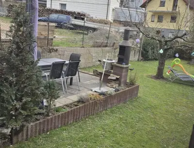 Ein Garten an der Unterkunft Ferienwohnung Ilka's Lodge