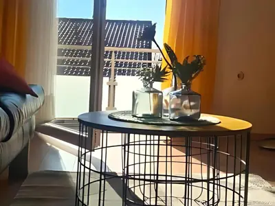 Ein Sitzbereich in der Unterkunft Apartment Pusteblume