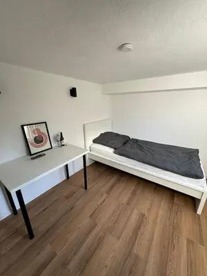 Ein Bett oder Betten in einem Zimmer der Unterkunft Rhein-Neckar-Apartments Viernheim