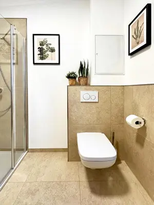 Ein Badezimmer in der Unterkunft COZEE - Cozy 1-room Apartment with Netflix
