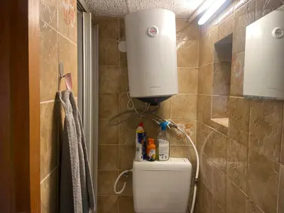 Ein Badezimmer in der Unterkunft Mini Bungalow Zimmer 1