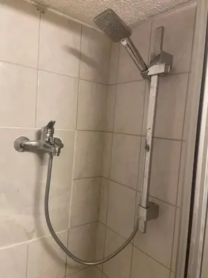 Ein Badezimmer in der Unterkunft Mini Bungalow Zimmer 1