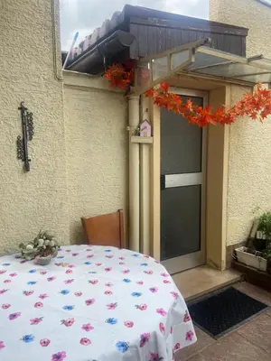Ein Bett oder Betten in einem Zimmer der Unterkunft Mini Bungalow Zimmer 1
