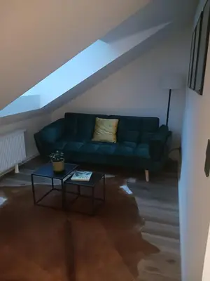 Ein Sitzbereich in der Unterkunft Ferienhaus am Wald