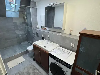Ein Badezimmer in der Unterkunft Moderne Maisonette-Wohnung