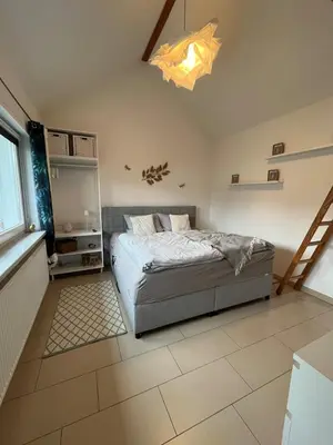 Ein Bett oder Betten in einem Zimmer der Unterkunft TinyHouse Pfalzperle - Auszeit nahe Deutsche Weinstraße & Therme