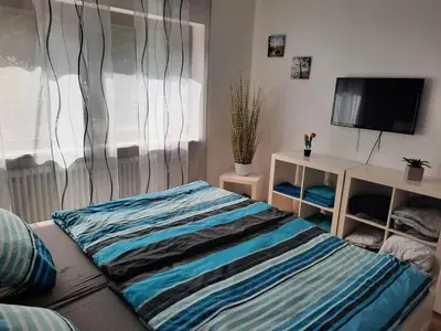 Ein Bett oder Betten in einem Zimmer der Unterkunft Dörrs vacation home with pool and garden
