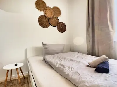 Ein Bett oder Betten in einem Zimmer der Unterkunft Cozy Studi Apartment II - Kaiserslautern