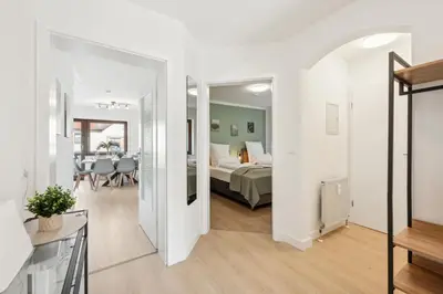 Ein Bett oder Betten in einem Zimmer der Unterkunft Sali Homes Weingenuss Eichbrunnen - Zentral