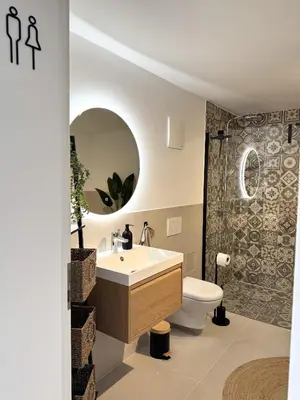 Ein Badezimmer in der Unterkunft WeinZeit13 Wohlfuehlen an der Weinstrasse mit Sauna