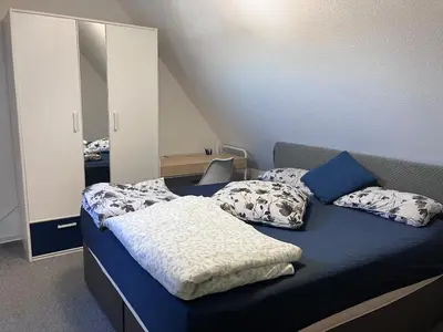 Ein Bett oder Betten in einem Zimmer der Unterkunft Tukhin's Residency - Studio Apartment & Deluxe 4 room Apartment