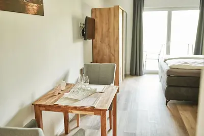 Ein Bett oder Betten in einem Zimmer der Unterkunft Weißwein Apartment