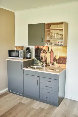 Küche/Küchenzeile in der Unterkunft Weißwein Apartment