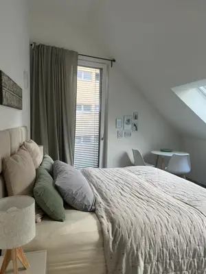 Ein Bett oder Betten in einem Zimmer der Unterkunft Träumen im Musikerviertel