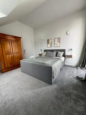 Ein Bett oder Betten in einem Zimmer der Unterkunft Träumen im Musikerviertel