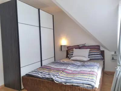 Ein Bett oder Betten in einem Zimmer der Unterkunft Studio im Herzen von Mainz-Hechtsheim