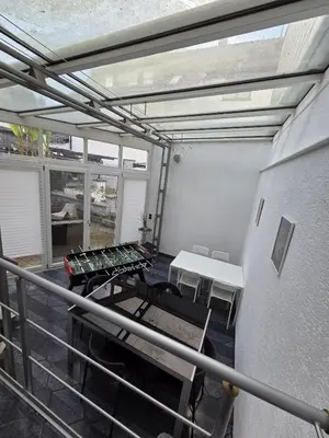 Küche/Küchenzeile in der Unterkunft Apartment mit Wintergarten - Knielingen Industriepark